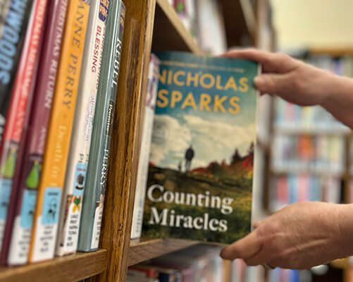 Person holding a book